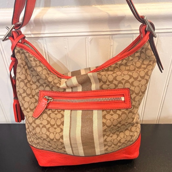 Coach Handbags - Coach Legacy Signature Stripe
Orange Duffle Jacquard Leather Bag
19918